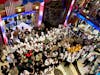 A crew gathering in the Atrium at the end of the cruise