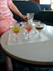 Martini tasting huge balcony at back corner of ship spacious cabin