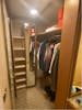 The closet space. Plenty of room, plus a safe on the shelves.