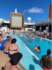 Guests versus Crew pool volleyball 