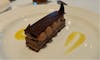 Chocolate Hazelnut Bar with Citrus Cream hazelnut dacquoise cake, dark and milk chocolate crème