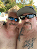 My Pops and I at the tiki table in the water, enjoying our cocktails. 