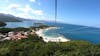 Looking down from the top of the zip line, with independence of the seas in tha background.