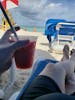 Daiquiri on the beach under our clam shell rental