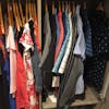 Closet with a week's worth of clothes for a family of 4