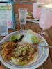 The Mexican food on the pool deck was great. The pork carnitas tacos with pico were my favorite. The drinks in the photo are the Lime & Coconut (the Lime & Coconut bar's signature drink).