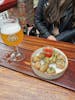 Meatballs and blonde beer in a Brugge brewery. 