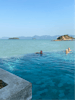 Infinity pool in hotel by pier