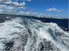 Our ferry's wake as we leave Playa Del Carmen in the distance.