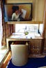 Work Desk with window over looking balcony on the Pinnacle Suite, Cabin 7001