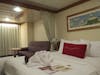 Deluxe family w/veranda. Qn bed, sofa bed, bunk over sofa, Murphy bed beyond