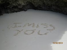 King's Wharf, Bermuda - A message written in the sand