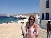 Catherine with the ship in the background at Mykonos.