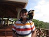 Zip line, Roatan, pet Monkey at entrance.