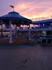 On the pool deck at sunset.