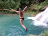 Cliff jumping at the Blue Hole, Jamaica.