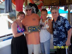 Grand Turk Island - Owners of Jack's Shack. They collect license plates, cheese & dark roast coffee.