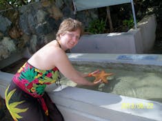 Charlotte Amalie, St. Thomas - Holding a starfish at Coral World.