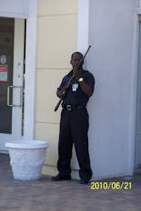 Nassau, Bahamas - A guard at the bank. If you zoom in, you can see the mean look on his face.