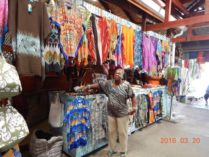 Straw market in St. Lucia. I bought a few things from her. - Carnival Pride