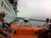 On the top of life boats heading to tender port