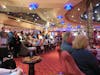 Room for chairs but folks had to stand in the back of the El Morocco night club.