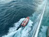 Pilot boat guides ship