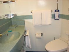 Washroom, shower to the right, next to toilet