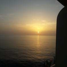 The sunset at sea the last night of the cruise.