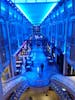 Promenade deck lit up blue at night