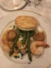 Seafood medley and green asparagus with puff pastry and lobster bisque