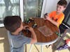 Boys on balcony playing