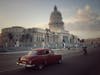 Classic car in from of Capital building