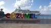 Our ship, VOS, ported directly behind the Cozumel sign. 