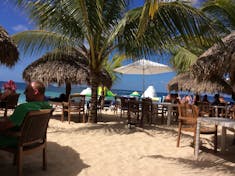 Cozumel, Mexico - Chairs and palapas on the beach.