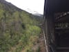 view from train winding up into the mountains