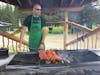 Cooking salmon at Taku Lodge.