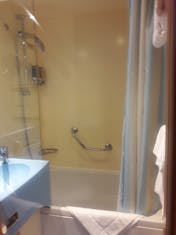 Bath with shower/ tub and sink