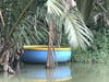 Hoi Ann, circular boats on river.