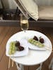 Champagne and chocolate covered strawberries in cabana