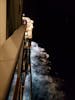 Night balcony view looking to front of ship