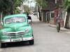 Classic late 1940s Plymouth in residential neighborhood in Havana