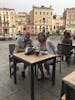 A glass of wine just beside the Rialto bridge