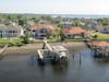 Homes along the St John's river.  People stand on their patios and wave as the ship passes.