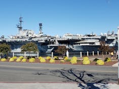 Majestic Princess parked next to USS Missouri in San Diego.