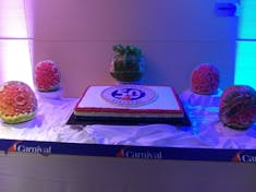 cake and carved melon