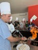Cozumel excursion: Chef Tabasco Cooking and Tasting . . . a shot of my cooking partner flaming the tequila off the dessert glaze.