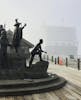 Statues in fog