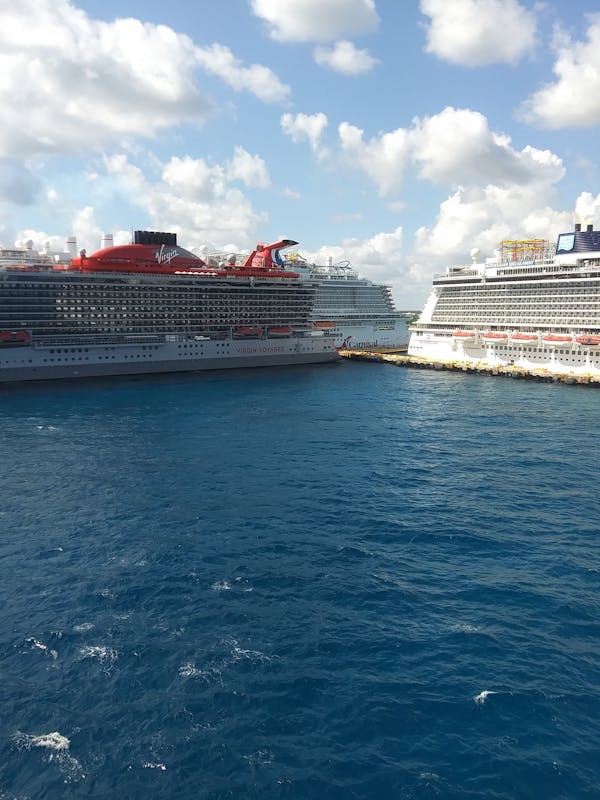 Our ship parallel parking next to the white one.  Amazing how they do this with just thrusters - Carnival Dream