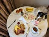 Breakfast- Room service is free for suites. 